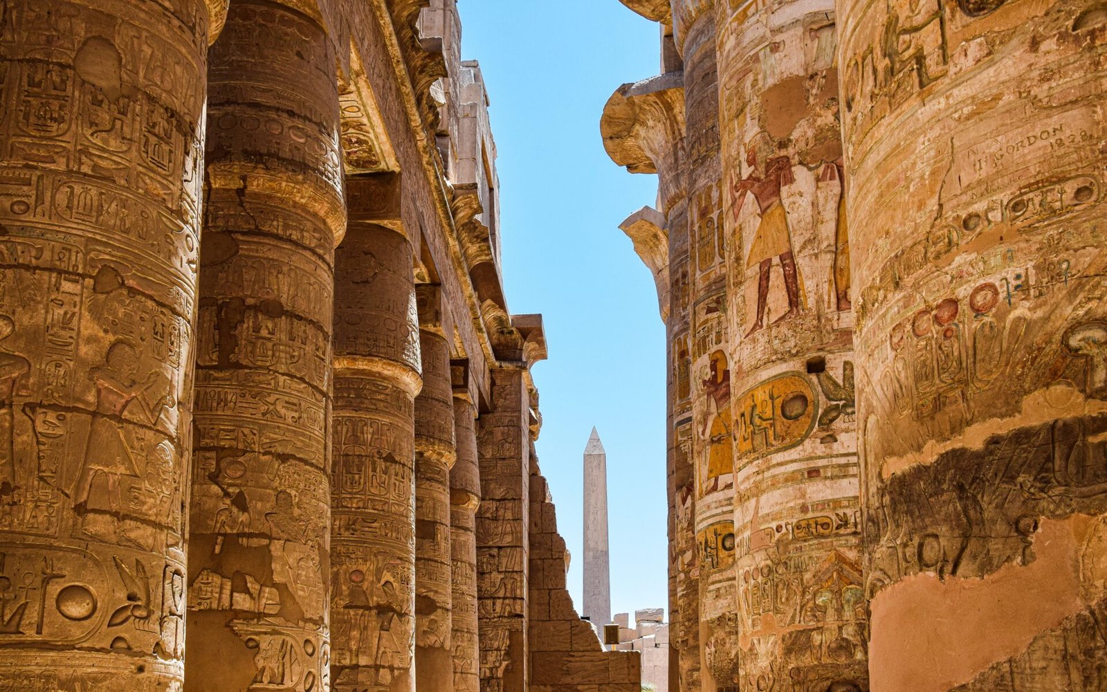 Columns and hieroglyphs at Karnak Temple in Luxor, Egypt.